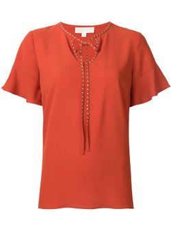 Camisa mao con tachas rojo